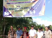 Hadiri Buka Desa di Mayumba, Bupati Morut Resmikan Jalan Raya